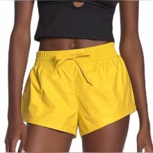 Free People FP Movement Moonlight Reflective Shorts in Yellow Size Medium